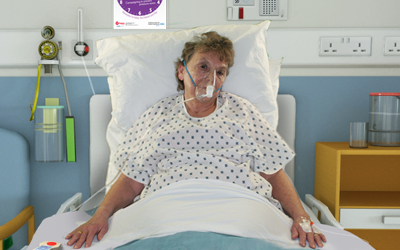 Carole in hospital bed