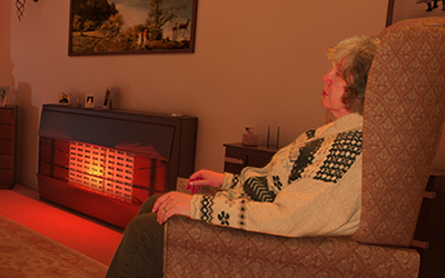 Diane sitting in her armchair