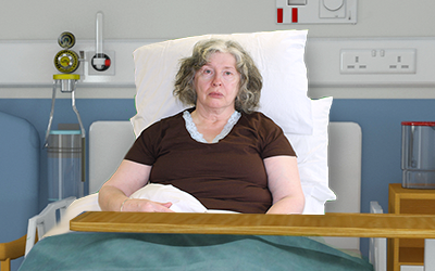 Janet Cole in hospital bed